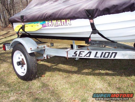 Jet ski on a Sea Lion trailer with a Yamaha cover