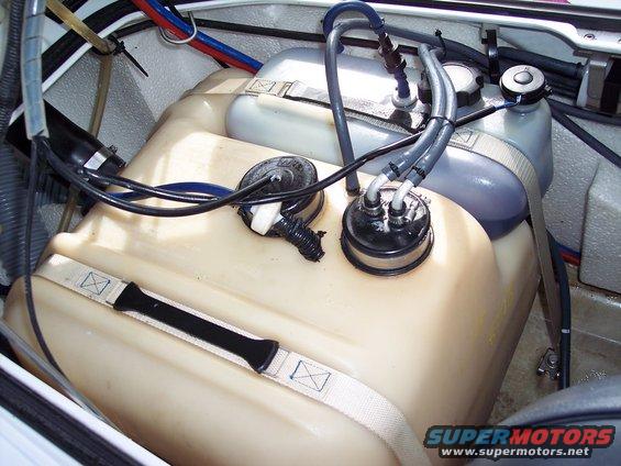 Jet ski engine bay with fuel tanks and hoses
