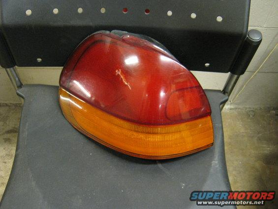 img_1676.jpg BK/BG right tail lamp with crack in lens. There's a hole on the inner edge of the amber as well. Free?