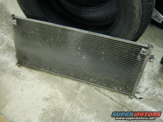 img_1756.jpg Condenser.... yeah I dunno. My car needs one but....