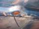 1973 Ford Ranchero - A close-up view of the underside of a vehicle's hood, showing a circular opening and a wire.