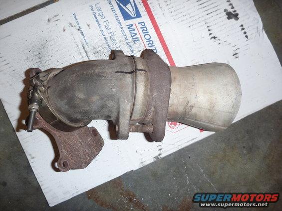 Exhaust manifold with catalytic converter on a Priority Mail box