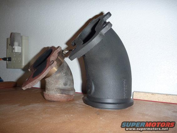 Two exhaust pipe sections, one old and rusty, the other new and black