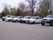1987 Ford Ranger - A lineup of Ford Ranger trucks, including a lifted silver model, are parked in an outdoor lot.