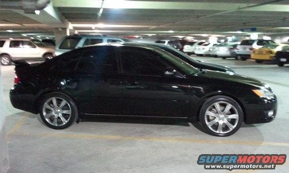 Black 2008 Subaru Legacy sedan, side view