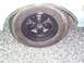 1966 Oldsmobile Cutlass - Close-up view of the rear wheel and fender of a 1966 Oldsmobile Cutlass.