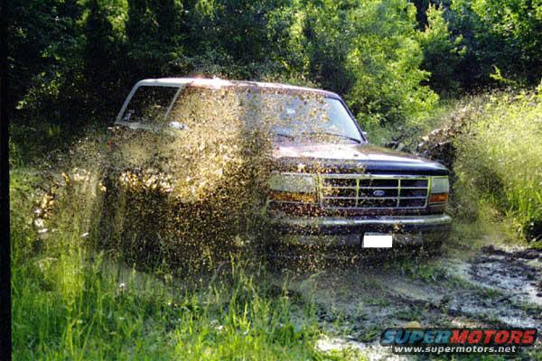 bronco2.jpg Playing in the mud when the truck was still stock.