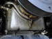 2003 Ford Taurus - Oil pan is leaking, indicating a potential maintenance issue.