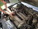 2003 Ford Taurus - Person holding a handful of carbon deposits removed from the engine of a 2003 Ford Taurus.