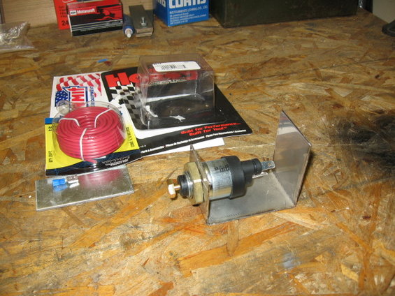 oba-fast-idle-001.jpg Ok so this is the bracket it's going into.  Couple more pics coming on how this mounts by the throttle and where it's wired to.