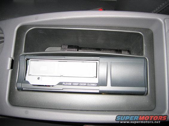 6 Disc changer in center console easy access part of Mach stereo system