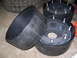 2001 Dodge 1500 - Tire inserts and wheels are laid out on a concrete floor.