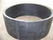 2001 Dodge 1500 - A close-up view of a cylindrical metal part with a textured surface and a polished rim.
