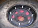2001 Dodge 1500 - A tire and wheel assembly is shown, with red rags stuffed inside the wheel.