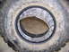2001 Dodge 1500 - A tire with a complex metal double beadlock assembly is shown, with the inner rim and tire wall visible.