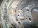 2001 Dodge 1500 - This is a close-up of a wheel hub, showing rust and damage, with a warning about clamp nuts.