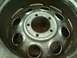 2001 Dodge 1500 - A custom steel wheel, likely modified or fabricated, is shown in detail. The welds indicate custom work.