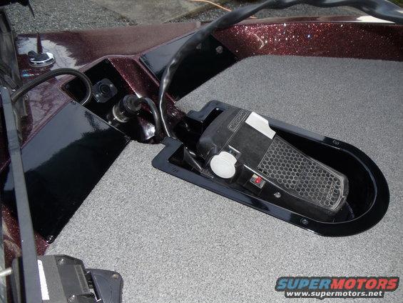 Recessed foot control tray with black pedal and red button