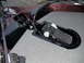 1993 Tracker Tournament - Close-up view of a recessed foot control tray, likely for a boat, a black pedal and a red indicator light.