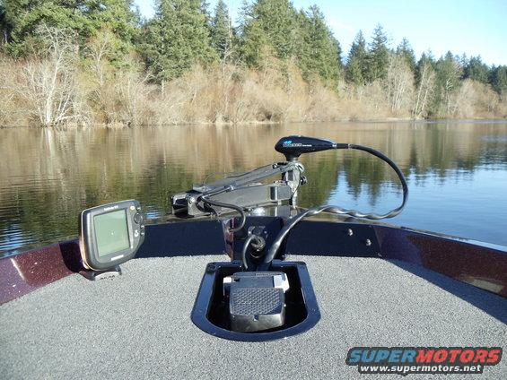 boat front with fish finder and trolling motor, lake in background