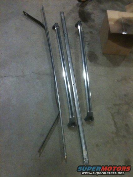 Chrome trim pieces on concrete floor