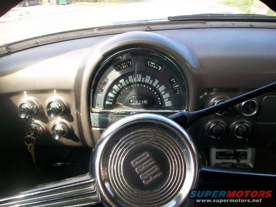 1952 Ford steering wheel and dashboard with odometer showing 09740
