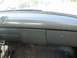 1952 Ford Mainline - The interior of a 1952 Ford Mainline shows the dashboard with a round gauge and glove box.