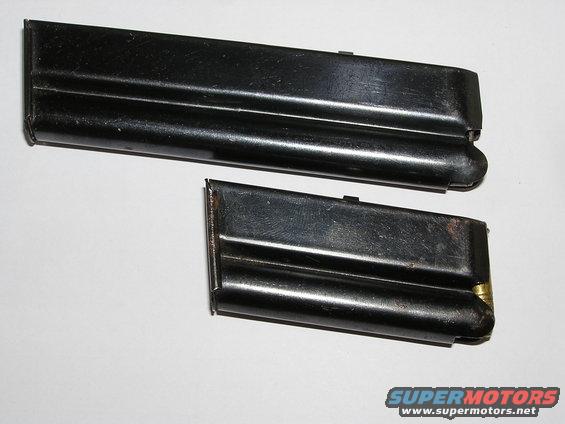 two black firearm magazines, one longer than the other, on a white background