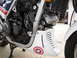1984 Honda Interceptor - Close-up view of a motorcycle's engine and lower fairing, a Captain America shield emblem.
