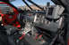 2011 Ford F-150 - Custom interior of a racing truck, a roll cage, racing seats, and a Lowrance GPS unit.