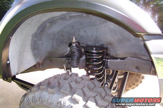 2000 Ford F-150 wheel well with lifted suspension and large tire