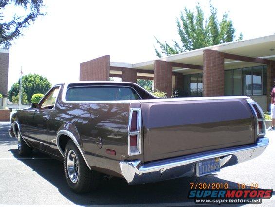 1979 Ford Ranchero pickup truck, rear 3/4 view, brown paint, chrome bumper and trim