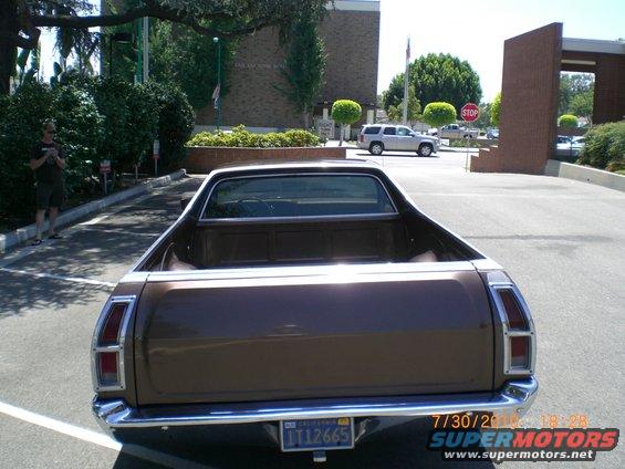 Rear view of a brown 1979 Ford Ranchero with a chrome bumper and a California license plate