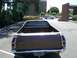 1979 Ford Ranchero - The rear of a classic Ford Ranchero pickup truck is shown parked on asphalt.