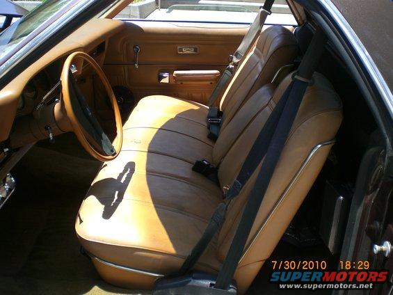 1979 Ford Ranchero interior showing tan vinyl seats, dashboard, and steering wheel