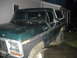 1993 Ford F-150 - This 1978 Ford Bronco is shown from the front 3/4 angle, displaying its green paint and white top.