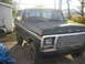 1993 Ford F-150 - This 1978 Ford Bronco is shown from a three-quarter front angle, parked in a driveway next to a shed.