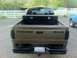 2001 Dodge Dakota - Rear view of a 2001 Dodge Dakota pickup truck, showing the tailgate and a toolbox in the bed.
