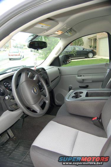 Interior of a 2007 Chevrolet Silverado 1500 showing the dashboard, steering wheel, and seats