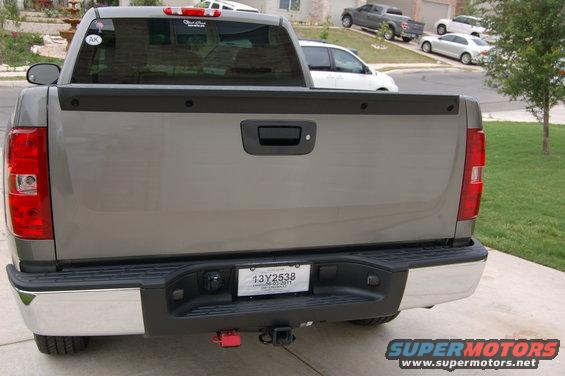 2007 Chevrolet Silverado 1500 rear view with chrome bumper and trailer hitch