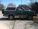 1989 Ford Bronco - This 1987 Ford Bronco is shown in a side profile, a two-tone paint scheme and a rear-mounted spare tire.