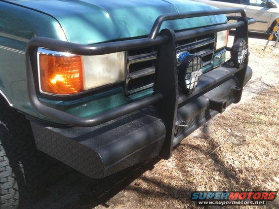 1989 Ford Bronco front end with brush guard, fog lights, and diamond plate bumper insert