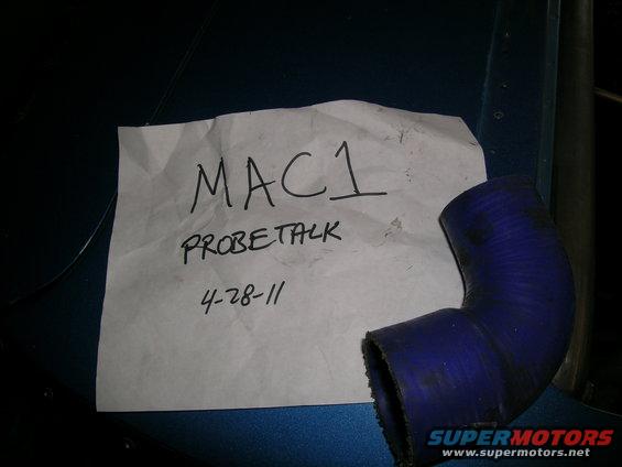 Blue silicone hose next to paper with 'MAC1', 'PROBETALK', and '4-28-11' written on it