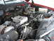 1994 GMC Sierra 3500 - Close-up view of a vehicle's engine bay, showing mechanical parts and wiring.