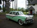 1956 Ford Fairlane - Two-tone green and white 1956 Ford Fairlane Crown Victoria parked outside a house.