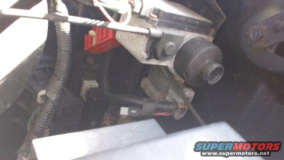 Engine component with red connector and wiring harness