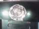 2001 Volkswagen Jetta - Emblem removed from the body of a green vehicle, showing signs of repair.