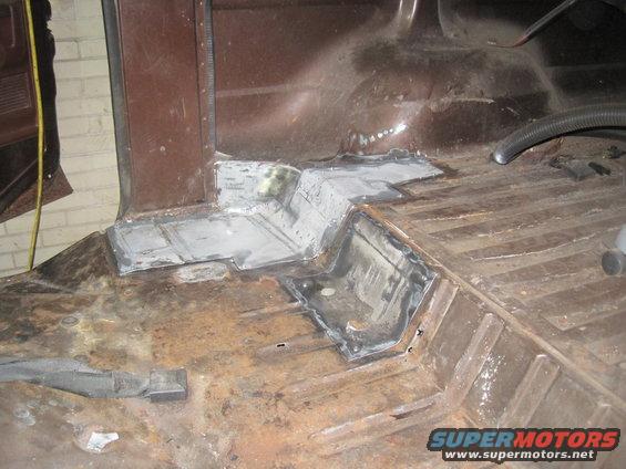 Interior floor pan repair with welded patches
