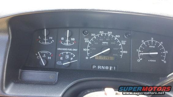dashboard with speedometer, tachometer, fuel, and temp gauges. Odometer reads 191145