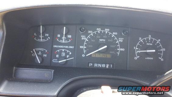 Dashboard gauges showing 191,145 miles, fuel, temperature, oil pressure, and RPM